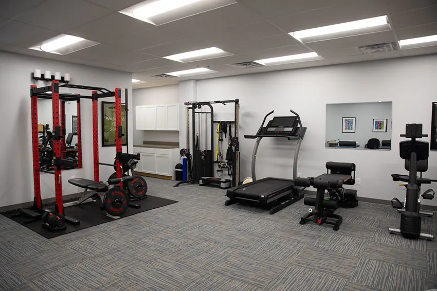 Strength training rack, treadmill, and exercise equipment